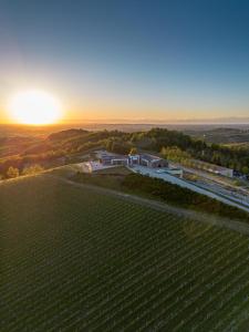 The sunrise or sunset as seen from a vendégházakat or nearby