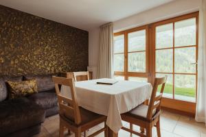 Posezení v ubytování Refugium LaFlu Apartments