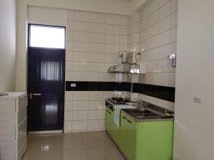 Kuhinja ili čajna kuhinja u objektu 南州民宿 NanChou Guesthouse