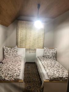 A bed or beds in a room at Casa de vacanta