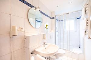 Koupelna v ubytování acora Bremen Garden Living the City + 13 fotografií