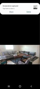 a webpage of a living room with couches and a table at Stay 3 km near to Airport Fes Saiss in Fez