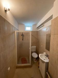 Phòng tắm tại Csomor Apartman