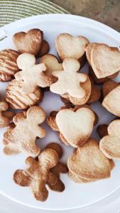a plate of cookies in the shape of hearts at Hotel Virginia in Garda