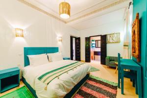 Postel nebo postele na pokoji v ubytování Riad Zinaida + 37 fotografií