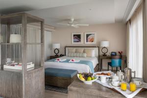 Postel nebo postele na pokoji v ubytování BodyHoliday St Lucia