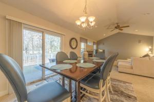a dining room with a table and chairs at Bed & Birdie - New Vacation Rental - Close to golf course & downtown in Saugatuck