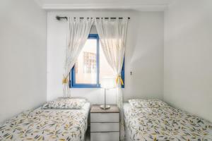 Un pat sau paturi într-o cameră la Luxe appartement 20 - Punta Glea +24 fotografii