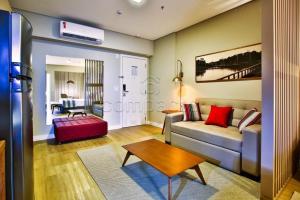 Postel nebo postele na pokoji v ubytování Flat & Lounge SQUARE FARIA LIMA
