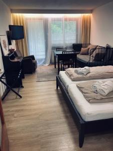 Μια τηλεόραση ή/και κέντρο ψυχαγωγίας στο FREE Apartment - Ermstal