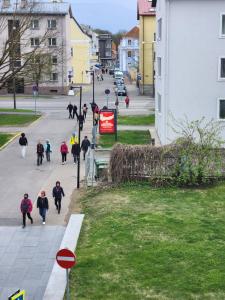 a group of people walking down a street at PÄRNU CENTER in Pärnu