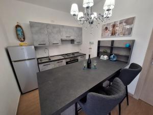 Køkken eller tekøkken på Appartamento lungo via del mare