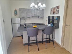 Køkken eller tekøkken på Appartamento lungo via del mare + 16 billeder