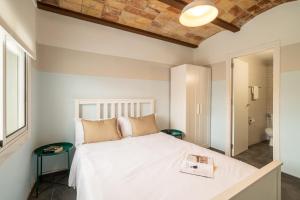 Posteľ alebo postele v izbe v ubytovaní Collblanc Apartment by Olala Homes