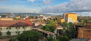 a view of a city with buildings and trees at Jesuit Residence in Galle +14 photos