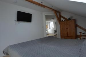Postel nebo postele na pokoji v ubytování Ferienwohnung Koldas DG