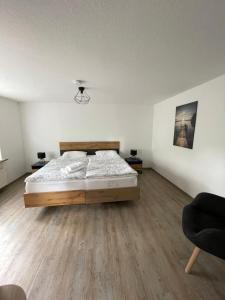 Ένα ή περισσότερα κρεβάτια σε δωμάτιο στο Ferienhaus Gronemann