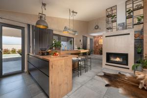 Kuchyň nebo kuchyňský kout v ubytování Casa Vigo Pula