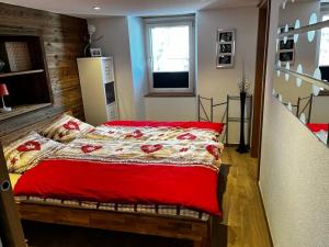 מיטה או מיטות בחדר ב-Ferienwohnung Casa Bolivia