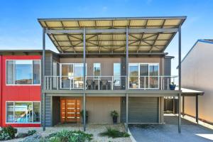 a house with an open roof with a deck at Riversea Goolwa Beach House in Goolwa