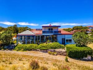 a house with a red roof at The Darling Of Marina - A Hilltop And Sea Getaway in Wirrina Cove