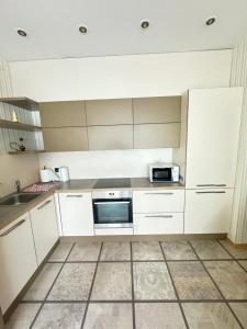 Köök või kööginurk majutusasutuses Vaidava’s Apartment