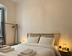 Ένα ή περισσότερα κρεβάτια σε δωμάτιο στο No Name - Via dell'Istria 12