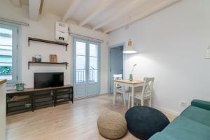 TV i/ili multimedijalni sistem u objektu Apartment Pontevedra 20m from the beach