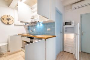 Kuhinja ili čajna kuhinja u objektu Apartment Pontevedra 20m from the beach