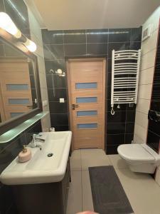 Kúpeľňa v ubytovaní Apartament Widokowy + 4 fotografie