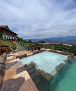 Bazén v ubytování Finca Hotel Isla del Encanto nebo v jeho okolí
