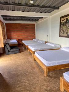 Postel nebo postele na pokoji v ubytování Finca Hotel Isla del Encanto