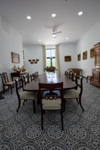a large dining room with a table and chairs at Finca La Fuensanta in Arcos de la Frontera