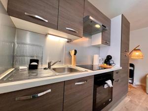 Η κουζίνα ή μικρή κουζίνα στο Appartement 4 prsn Au pied de la Citadelle