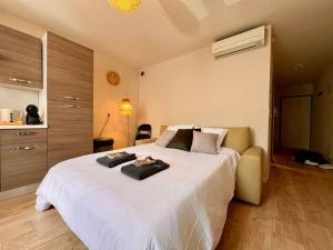 Ένα ή περισσότερα κρεβάτια σε δωμάτιο στο Appartement 4 prsn Au pied de la Citadelle