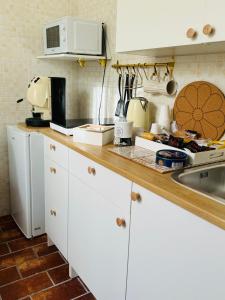 Kuchyň nebo kuchyňský kout v ubytování B&B La Meta