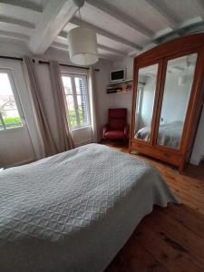 Postel nebo postele na pokoji v ubytování Une parenthèse en bord de mer