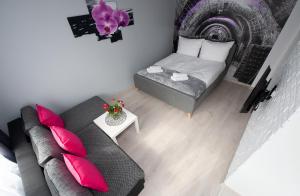 Ένα ή περισσότερα κρεβάτια σε δωμάτιο στο Apartament blisko ZOO, Orientarium oraz Atlas Areny