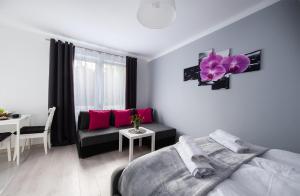 Χώρος καθιστικού στο Apartament blisko ZOO, Orientarium oraz Atlas Areny