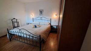 A bed or beds in a room at Casa Lino