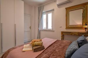 Postel nebo postele na pokoji v ubytování Casa mare & spa Alghero