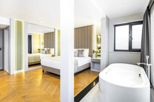 Postel nebo postele na pokoji v ubytování Rast Hotel Sultanahmet