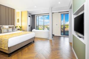 Postel nebo postele na pokoji v ubytování Rast Hotel Sultanahmet