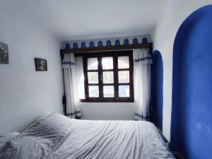 Postel nebo postele na pokoji v ubytování Casa Mablu