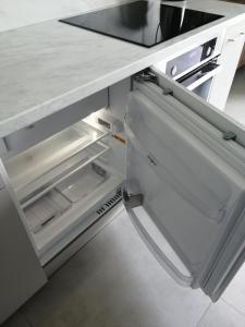 Kuchyňa alebo kuchynka v ubytovaní Apartament Zielone Wzgórze 2