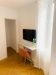 Televízia a/alebo spoločenská miestnosť v ubytovaní Casa del Azucar