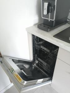 Kuchyňa alebo kuchynka v ubytovaní Apartament Zielone Wzgórze 2