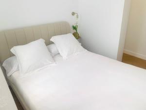 Posteľ alebo postele v izbe v ubytovaní Casa del Azucar