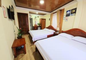 Letto o letti in una camera di Bình Đào Hotel - Khách sạn ngay trung tâm giá rẻ