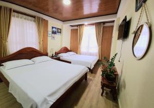 Letto o letti in una camera di Bình Đào Hotel - Khách sạn ngay trung tâm giá rẻ